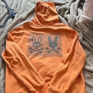 Psycho Bunny Orange Hoodie with Black Bunny Skull Emblem